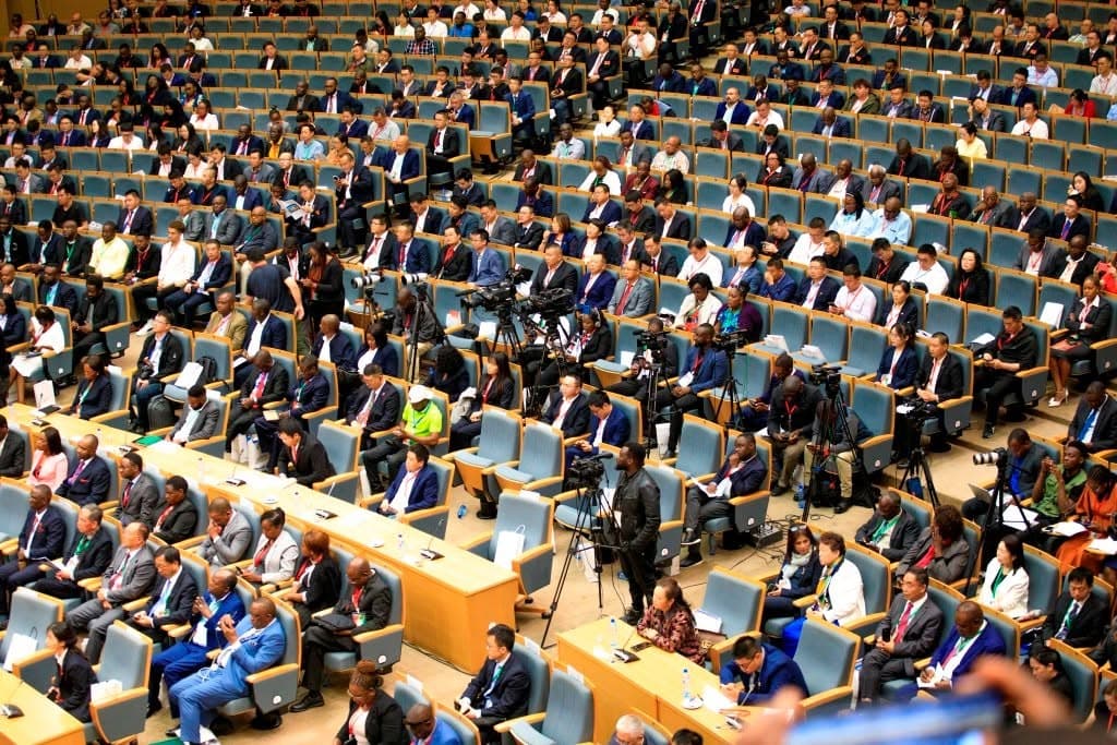 Large conference hall filled with delegates